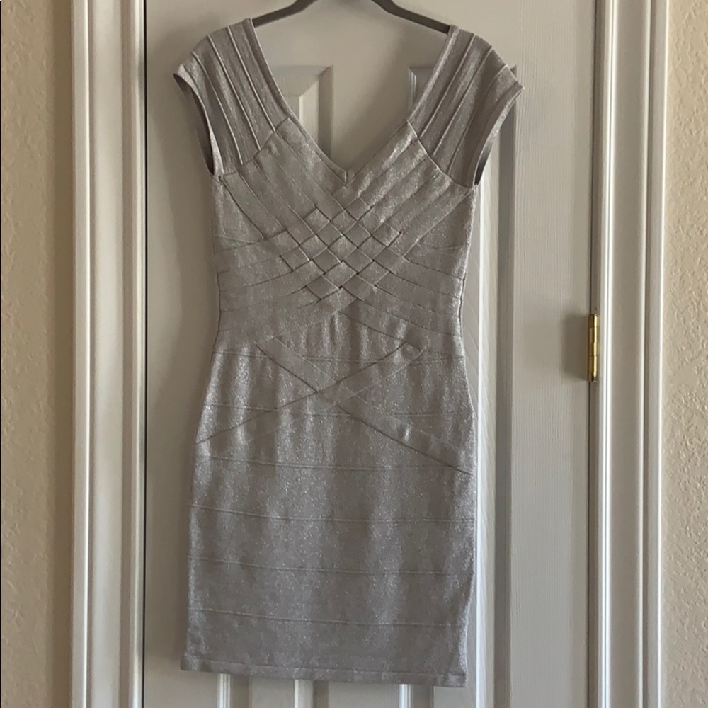 Never worn silver wrap dress size M